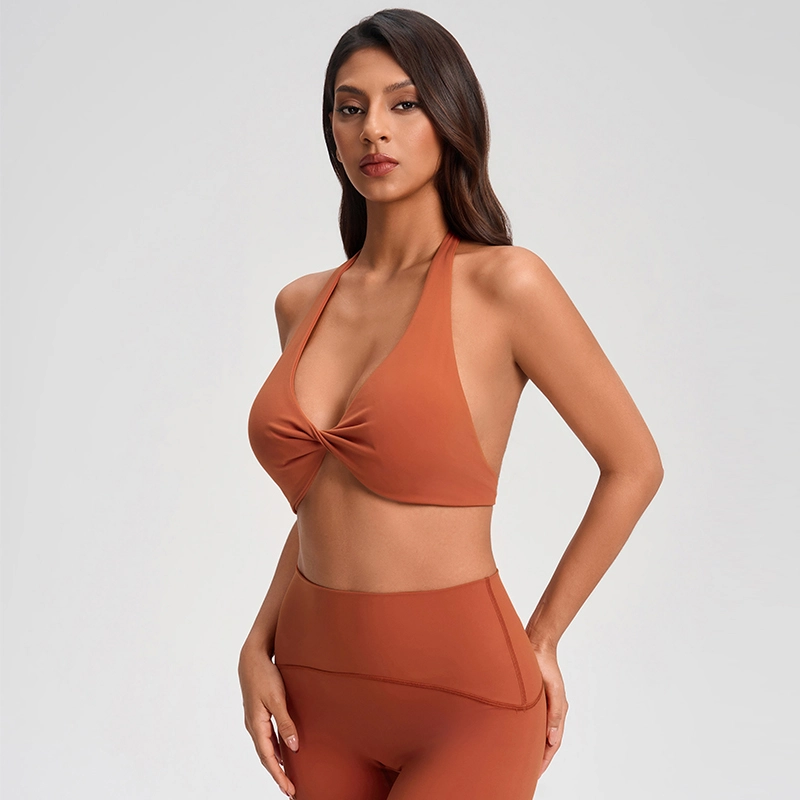Custom Halter Deep V-Neck Sports Bra – Twist Front | MZ-1005 4 Side view of muzyoga halter deep V-neck sports bra showing side bust coverage and supportive band.