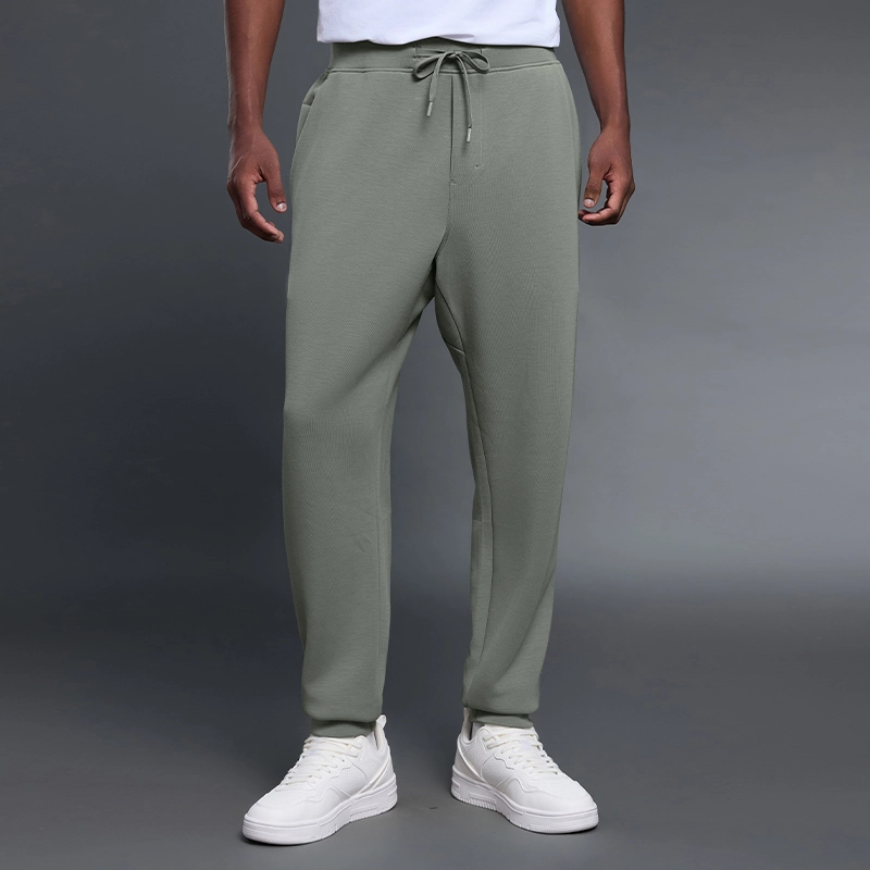 MZ-MWP002 | Wholesale Men's Joggers: 300G Brushed Air-Layer Fabric & Secure Back Zip Pocket - Iron Mountain Green - muzyoga 1 Front view of men's Iron Mountain Green thermal joggers.