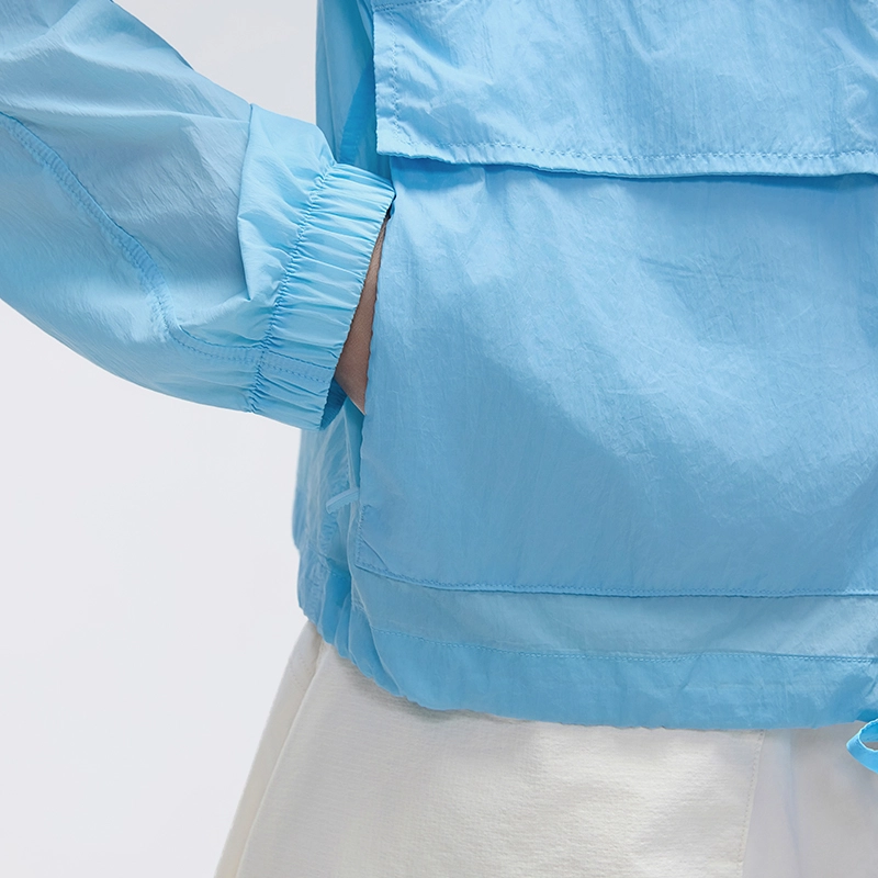 MZ-006 | Wholesale Ultra-Light Packable Sun Jacket: 25G Crinkled Nylon & Water-Repellent - Bluebell - muzyoga 5 Close-up of the reinforced stitching on the dual-opening pockets.