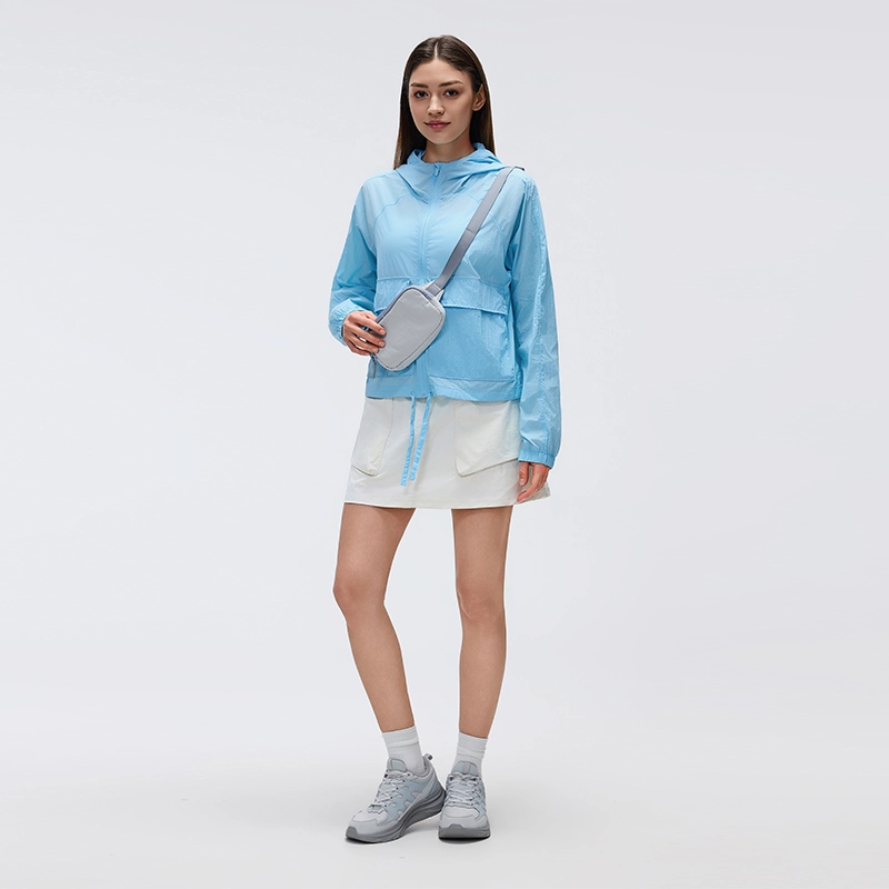 MZ-006 | Wholesale Ultra-Light Packable Sun Jacket: 25G Crinkled Nylon & Water-Repellent - Bluebell - muzyoga 8 Lifestyle view of MZ-006 during a hiking session in Bluebell color.