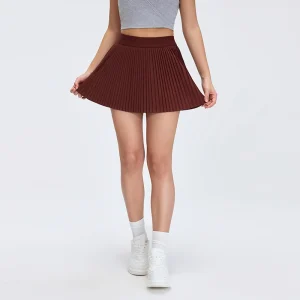 Front view of MZ-008 Rockwood Orange high-waisted pleated tennis skirt.