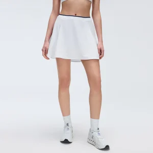 Front view of MZ-010 White high-waisted 2-in-1 tennis skirt.