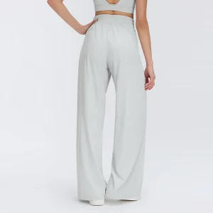 muzyoga-MZ014-relaxed-back-silhouette-view.webp Rear view showcasing the smooth drape and elongated leg design.