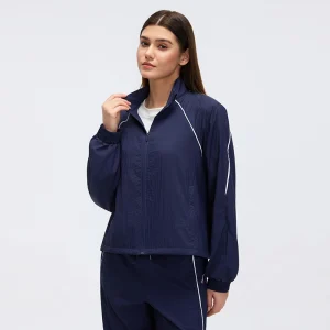 Detailed view of the windproof standing collar and smooth zipper closure.
