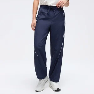 Front view of MZ-019 Navy Blue mid-rise adjustable sports pants.