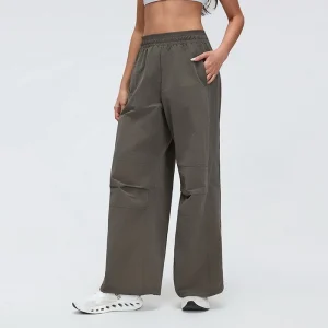 Side view of MZ-044 highlighting the ergonomic knee pleats and relaxed fit.