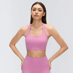 Front view of Frost Pink U-neck yoga bra with wide straps.