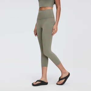 Side view showcasing the sleek 3/4 length and body-contouring fit.
