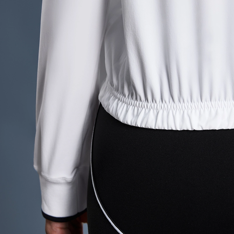 MZ-105 | Wholesale Cotton-Feel Sun Protection Jacket: 165G 4-Way Stretch & Stand Collar - White - muzyoga 7 Close-up of the high-quality stitching on the jacket's hemline.
