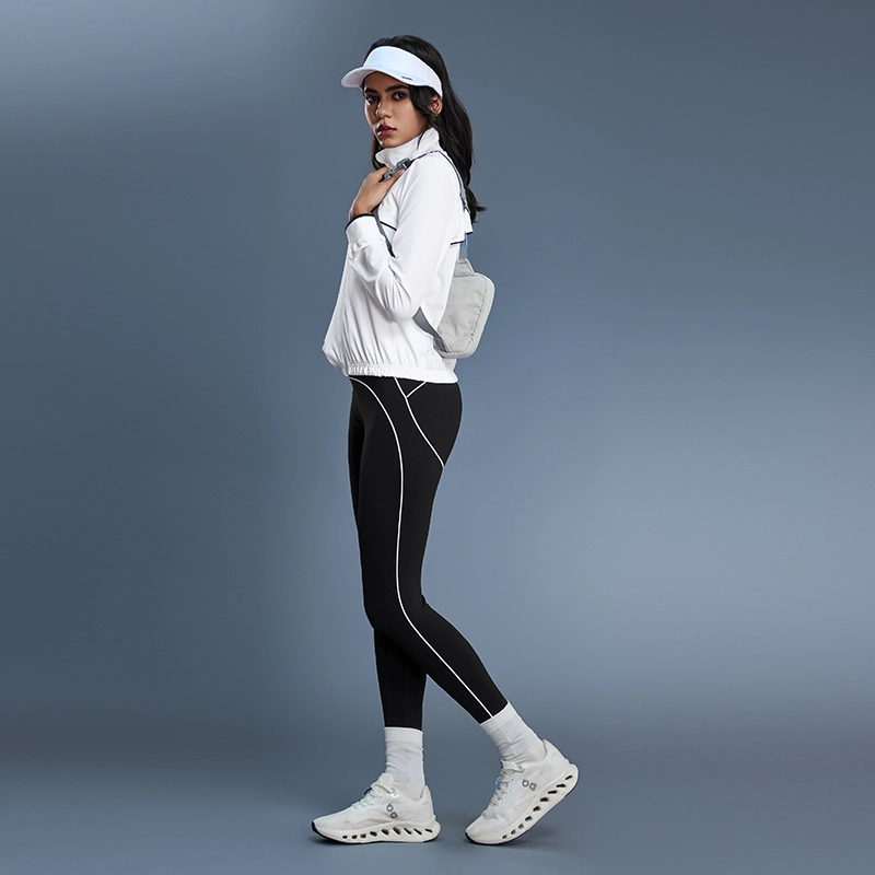 MZ-105 | Wholesale Cotton-Feel Sun Protection Jacket: 165G 4-Way Stretch & Stand Collar - White - muzyoga 8 Lifestyle view of MZ-105 white jacket in an outdoor sports setting.