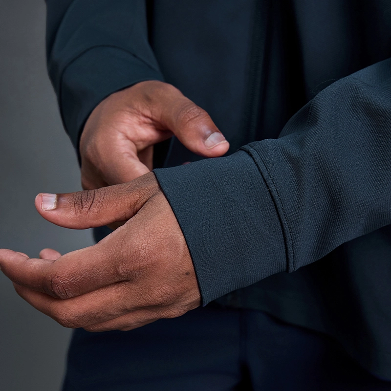 MZ-MJ001 | Wholesale Men's Full-Zip Performance Jacket: 200G Fine-Ribbed Tech Fabric & Secure Zip Pockets - Deep Sea Blue - muzyoga 6 Close-up of elastic wind-resistant cuffs on the sleeves.