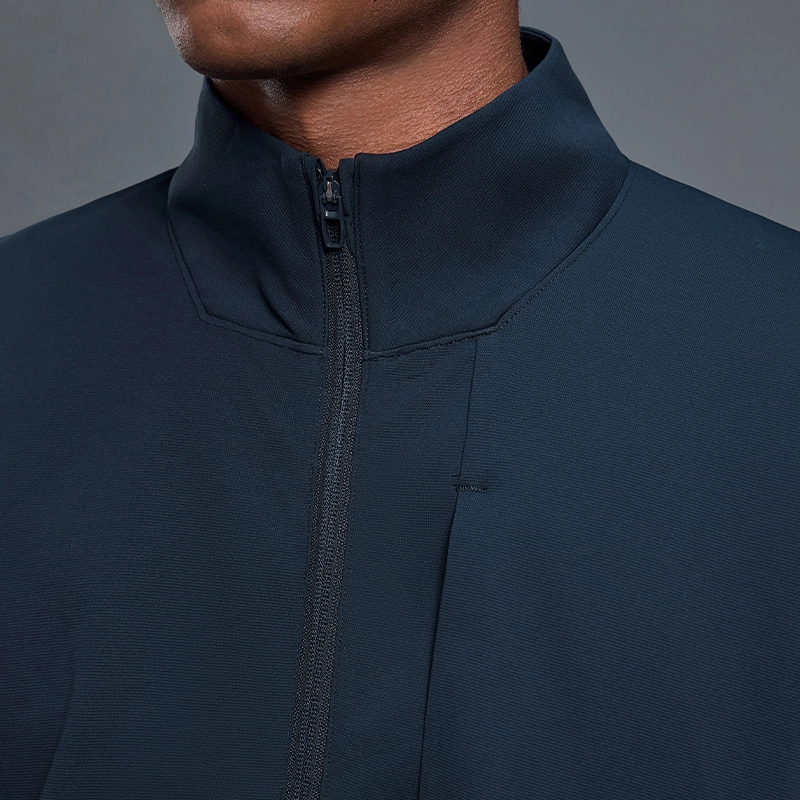 MZ-MJ001 | Wholesale Men's Full-Zip Performance Jacket: 200G Fine-Ribbed Tech Fabric & Secure Zip Pockets - Deep Sea Blue - muzyoga 3 Detailed view of the structured stand-up collar on MZ-MJ001.