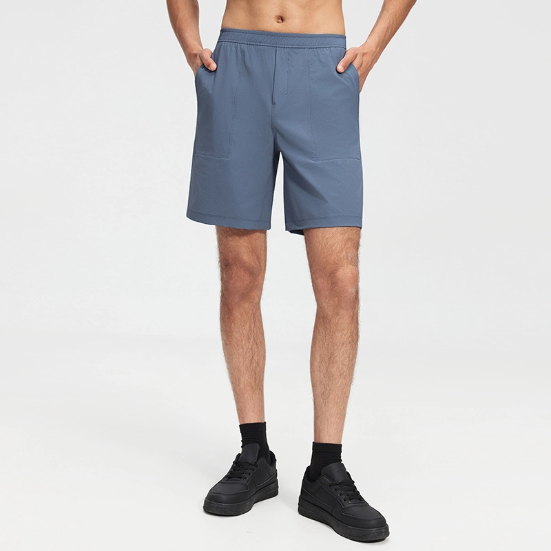 MZ-MS003 | Wholesale Men's Tech Casual Shorts: Water-Repellent 4-Way Stretch & Secure Zip Pocket - Washed Denim Blue - muzyoga 1 Front view of men's Washed Denim Blue tech casual shorts.