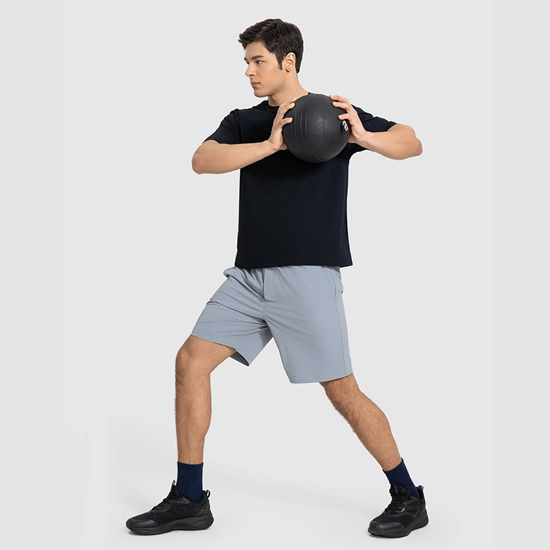 MZ-MT003 | Wholesale Men's Short-Sleeve Training Tee: 120G Quick-Dry Fabric & Cotton-Soft Touch - Black - muzyoga 3 Man training in the gym wearing Black MZ-MT003 short-sleeve tee.