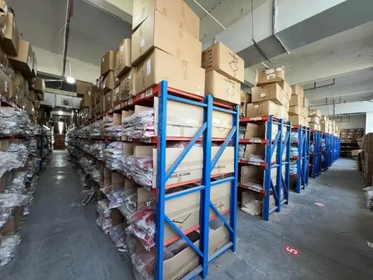 Muzyoga warehouse showing high-capacity inventory for wholesale yoga wear and startup activewear brands.