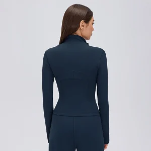 Rear view of a Navy Blue fitted workout jacket with curved upper-back stitching, contoured waist panels and long sleeves.