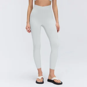 Front view of women's V-waist leggings in Steam Gray, showing the shaped high-rise waistband and fitted ankle-length silhouette.
