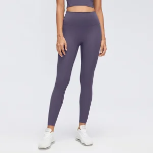 Front view of women's high-waisted yoga leggings in Deep Purple, showing a smooth front panel and fitted ankle-length legs.