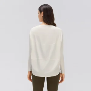 Relaxed Fit Yoga Top – Curved Back Panel Detail Rear view of an Ivory White long sleeve yoga top showing dropped shoulders, a curved upper-back seam and a slightly longer rounded back hem.