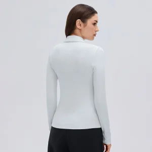 Elegant Blue Modal Long Sleeve Top – Back View Back view of an Elegant Blue fitted modal long sleeve top showing the shirt collar, long sleeves and shaped waist.
