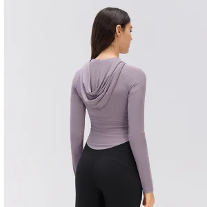Hibiscus Purple Fitted Hooded Top – Back View Rear view of a Hibiscus Purple fitted long sleeve top showing the draped hood, close-fitting back and curved lower hem.