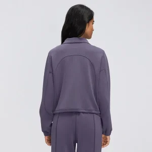 Women’s Half-Zip Pullover – Back View Back view of Grape Purple women's half-zip pullover showing the curved upper-back seam, relaxed sleeves and gathered cuffs.