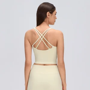 Rear view of a Cream Yellow yoga tank top featuring multiple slim crisscross straps and an open-back design.
