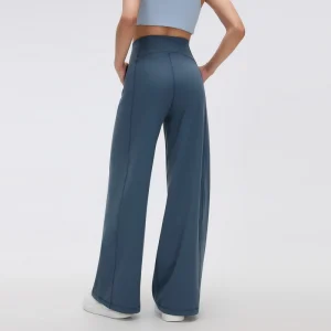 Women’s Wide-Leg Athletic Pants – Steel Blue Back View Back view of Steel Blue women's wide-leg athletic pants, showing the elastic waistband, rear seam construction and relaxed full-length legs.