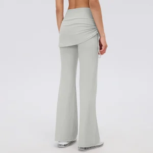 Pigeon Gray Skirted Flare Pants – Back View Back view of Pigeon Gray skirted flare pants showing the draped overlay across the hips, gathered side drawstring and flared legs.