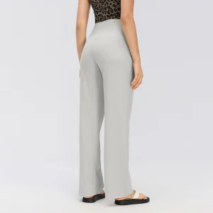 Pigeon Gray Relaxed Straight-Leg Pants – Back View Rear three-quarter view of Pigeon Gray relaxed straight-leg pants showing the high-rise waistband, curved back seam and loose full-length legs.