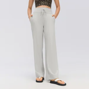 Front view of women's Pigeon Gray relaxed straight-leg drawstring pants with a high-rise waistband, slanted side pockets and full-length legs.
