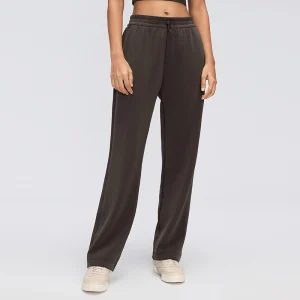 Front view of women's modal blend straight-leg pants in Mahogany Brown, showing a relaxed fit, elastic waistband and open hems.